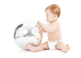 Image showing adorable baby boy with big disco ball