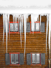 Image showing Wooden windows with  ice stalactites