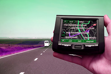 Image showing GPS in a man hand