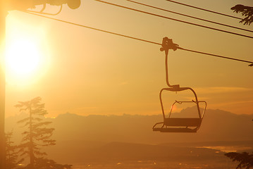 Image showing Chair lift in sunrise