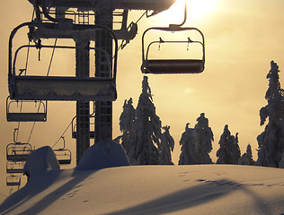 Image showing Chair lift in sunset