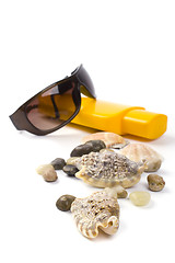 Image showing shells, sunglasses and lotion