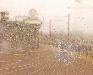 Image showing Cracked glass on a train platform