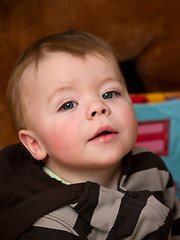 Image showing Cute little  baby boy looking up 