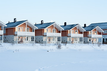 Image showing Lodges in snow