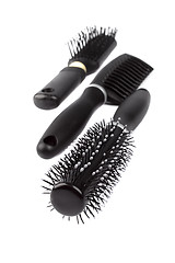 Image showing three hairbrushes