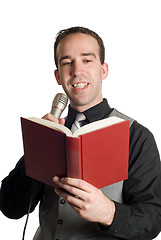 Image showing Man Reading Into Microphone