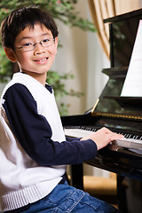 Image showing Playing piano