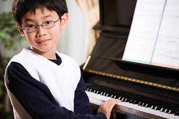 Image showing Playing piano