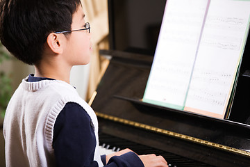 Image showing Playing piano