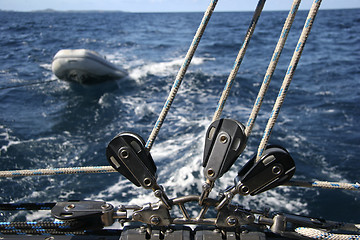 Image showing Winch with rope and a dinghy