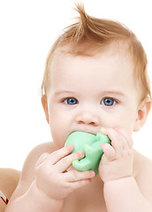 Image showing baby boy with green plastic toy