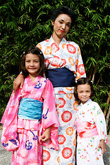 Image showing Family dressed in kimono.