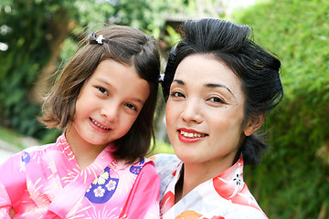 Image showing Family dressed in kimono.