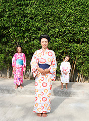 Image showing Family dressed in kimono.