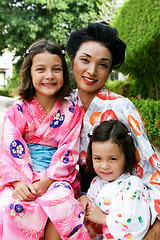 Image showing Family dressed in kimono.