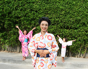 Image showing Family dressed in kimono.