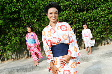 Image showing Family dressed in kimono.