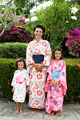 Image showing Family dressed in kimono.