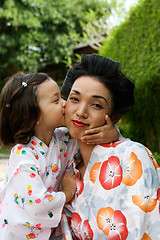 Image showing Family dressed in kimono.