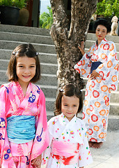 Image showing Family dressed in kimono.