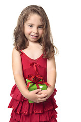 Image showing Pretty girl holding a present