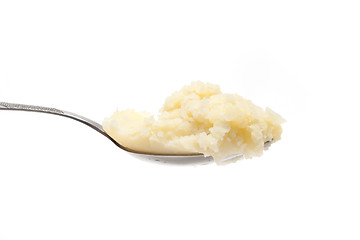 Image showing Spoon with mashed potatoes left