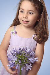 Image showing Sweet girl with lily flower