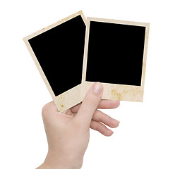 Image showing two photo frames in a hand 