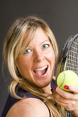 Image showing woman tennis player happy