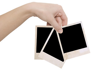 Image showing three photo frames in a hand