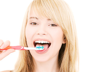 Image showing happy girl with toothbrush