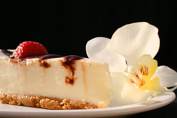 Image showing Cheesecake And An Orchid