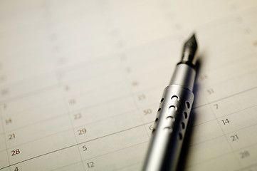 Image showing Pen and calender