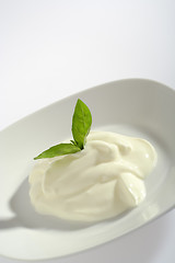 Image showing Creme fraiche with basil