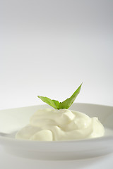 Image showing Creme fraiche with basil