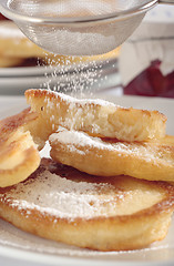 Image showing Polish doughnuts with icing sugar