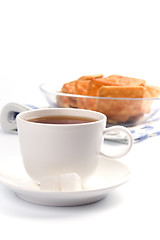 Image showing cup of tea, sugar and cookies