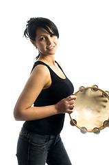 Image showing sexy woman playing tambourine