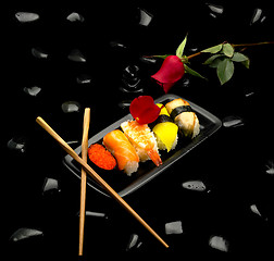 Image showing assorted sushi plate and rose