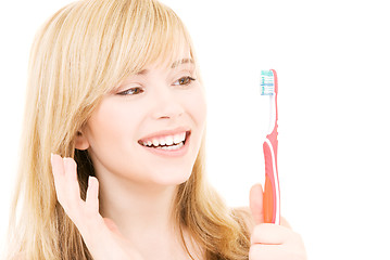 Image showing happy girl with toothbrush