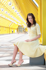 Image showing young woman in yellow dress