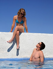 Image showing Couple by the pool