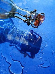 Image showing Glass bottle and water