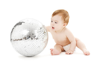 Image showing adorable baby boy with big disco ball