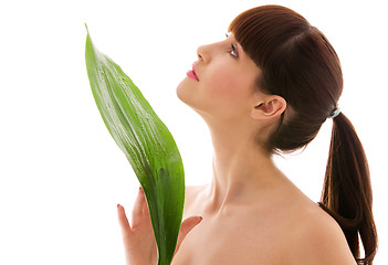 Image showing woman with green leaf