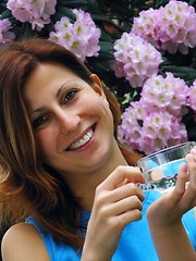 Image showing Young girl drinking water