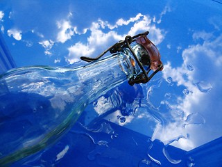 Image showing Glass bottle and water