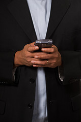 Image showing Business man texting