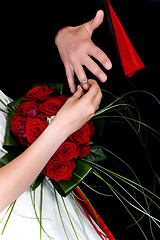 Image showing Hands over wedding bouquet